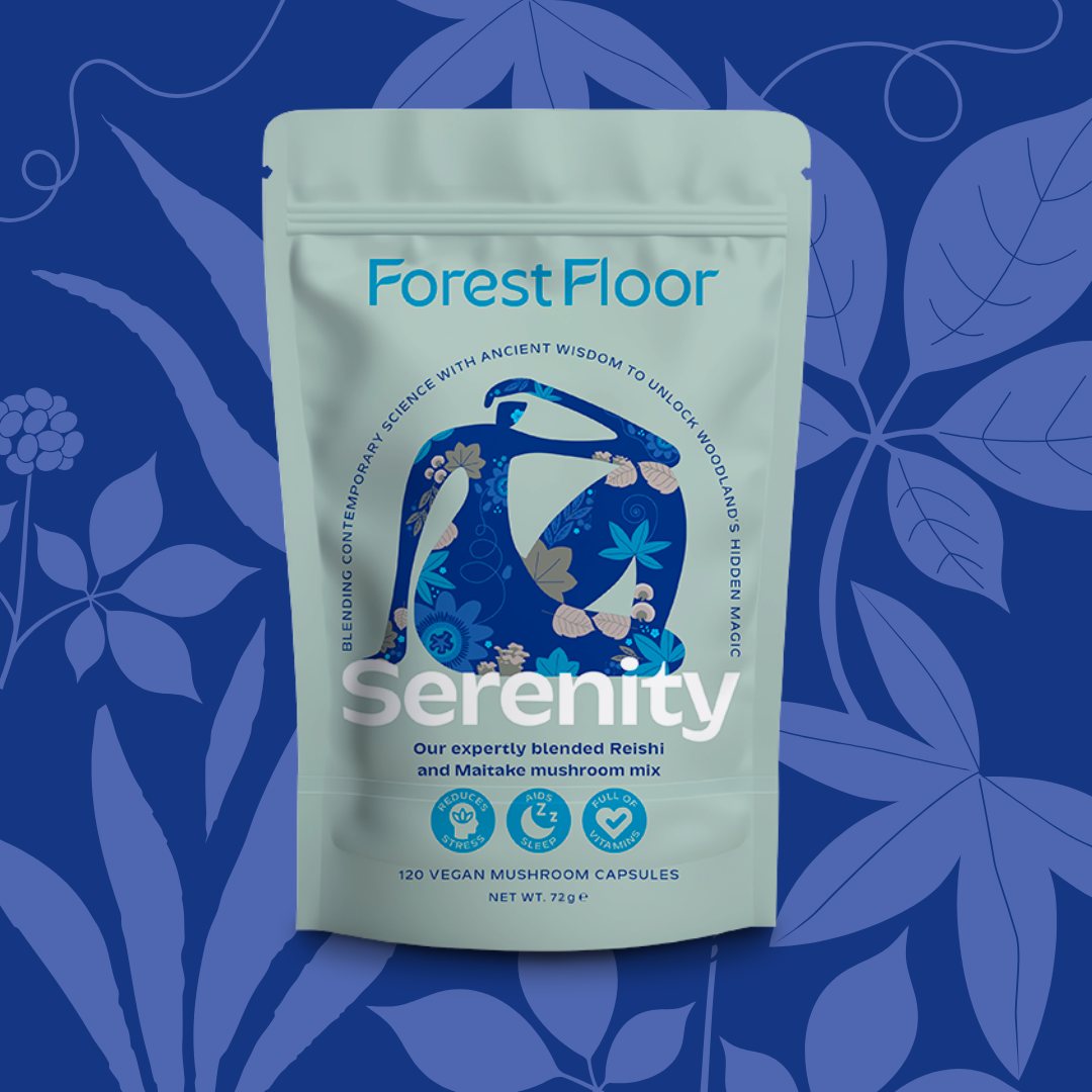Forest Floor Serenity pouch, a Reishi and Maitake mushroom mix, on a blue floral background