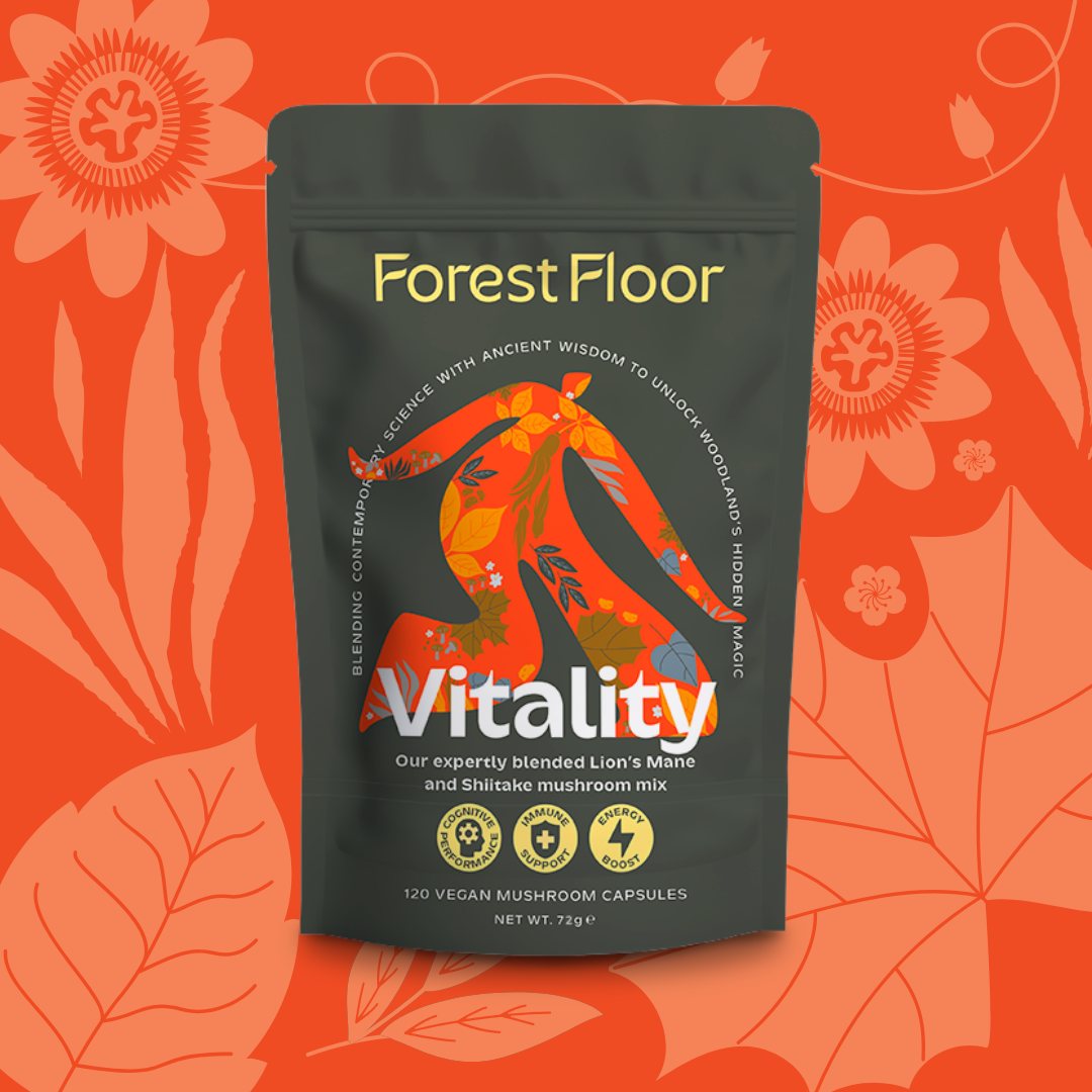 Forest Floor Vitality pouch, a Lion’s Mane and Shiitake mushroom mix, on an orange floral background